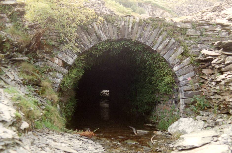 * [Pic 7] Minllyn Quarry - Closer view of main tunnel showing stone lining (1989) *